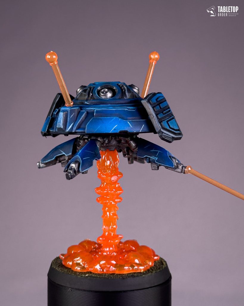 Painted StarCraft Point Defense Drone with orange energy effects
